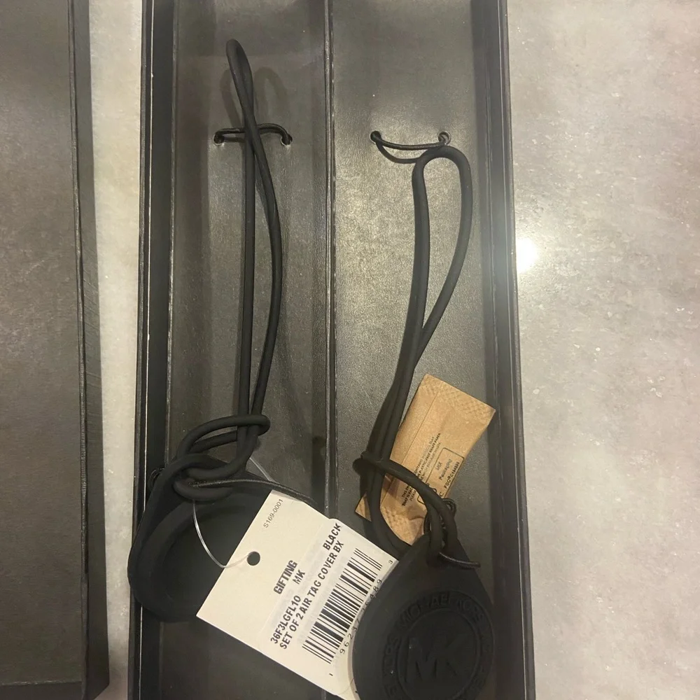 NWT Micheal Kors set of 2 Air tag covers black
